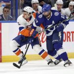 
              Tampa Bay Lightning's Alex Killorn (17) checks New York Islanders' Mathew Barzal during the first period of an NHL hockey game Monday, Nov. 15, 2021, in Tampa, Fla. (AP Photo/Mike Carlson)
            