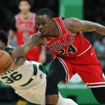 
              Chicago Bulls' Javonte Green (24) battles Boston Celtics' Marcus Smart (36) for a loose ball during the first half of an NBA basketball game, Monday, Nov. 1, 2021, in Boston. (AP Photo/Michael Dwyer)
            