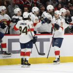 
              Florida Panthers left wing Jonathan Huberdeau (11) celebrates his goal during the first period of an NHL hockey game against the Washington Capitals, Friday, Nov. 26, 2021, in Washington. (AP Photo/Nick Wass)
            