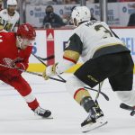 
              Detroit Red Wings right wing Filip Zadina (11) drives toward the goal against Vegas Golden Knights defenseman Brayden McNabb (3) during the first period of an NHL hockey game, Sunday, Nov. 7, 2021, in Detroit. (AP Photo/Duane Burleson)
            