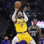
              Los Angeles Lakers forward Carmelo Anthony (7) shoots against the Sacramento Kings during the first quarter of an NBA basketball game in Sacramento, Calif., Tuesday, Nov. 30, 2021. (AP Photo/Randall Benton)
            