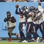 
              Houston Texans cornerback Desmond King (25) celebrates after intercepting a pass against the Tennessee Titans in the second half of an NFL football game Sunday, Nov. 21, 2021, in Nashville, Tenn. (AP Photo/Wade Payne)
            