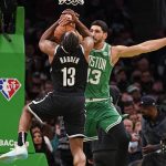 
              Boston Celtics center Enes Kanter, right, blocks Brooklyn Nets guard James Harden (13) during the first half of an NBA basketball game, Wednesday, Nov. 24, 2021, in Boston. (AP Photo/Charles Krupa)
            