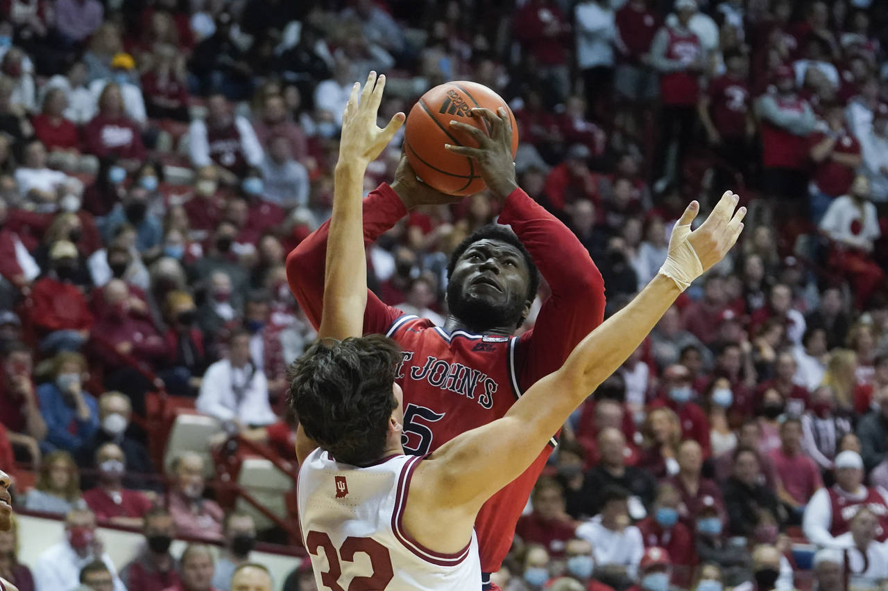 St. John's Dylan Addae-Wusu (5) shoots over Indiana's Trey Galloway (32) during the first half of a...