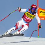 
              Beat Feuz of Switzerland flies down the course during the second Men's World Cup downhill training run in Lake Louise, Alberta, Wednesday, Nov. 24, 2021. (Frank Gunn/The Canadian Press via AP)
            