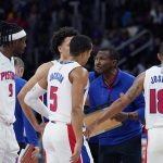 
              Detroit Pistons head coach Dwane Casey talks to the team during a timeout in the second half of an NBA basketball game, Sunday, Nov. 21, 2021, in Detroit. (AP Photo/Carlos Osorio)
            