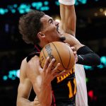 
              Atlanta Hawks guard Trae Young (11) goes up for a shot against the Boston Celtics in the second half of an NBA basketball game Wednesday, Nov. 17, 2021, in Atlanta. (AP Photo/John Bazemore)
            