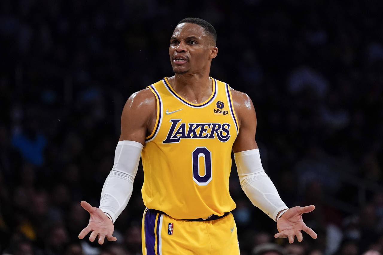 Los Angeles Lakers guard Russell Westbrook (0) disputes a call, causing a delay of game penalty dur...