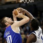 
              Los Angeles Clippers center Ivica Zubac (40) has his shot blocked by Minnesota Timberwolves forward Anthony Edwards (1) during the first half of an NBA basketball game Wednesday, Nov. 3, 2021, in Minneapolis. (AP Photo/Andy Clayton-King)
            