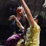 
              Florida State forward Malik Osborne (10) gets tied up with Purdue center Zach Edey (15) as they go for a rebound during the first half of an NCAA college basketball game in West Lafayette, Ind., Tuesday, Nov. 30, 2021. (AP Photo/Michael Conroy)
            