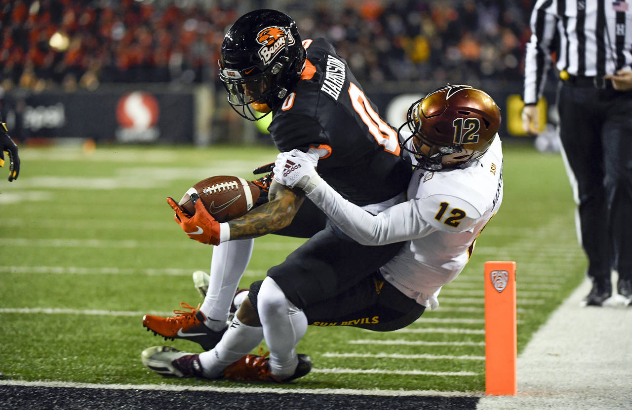 Oregon State wide receiver Tre'Shaun Harrison (0) gets into the end zone as Arizona State defensive...