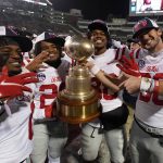
              Mississippi players celebrate their win over Mississippi State and their retaining of the "Golden Egg" trophy following an NCAA college football game against Mississippi State, Thursday, Nov. 25, 2021, in Starkville, Miss. (AP Photo/Rogelio V. Solis)
            
