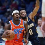 
              Oklahoma City Thunder forward Luguentz Dort (5) goes to the basket against New Orleans Pelicans guard Nickeil Alexander-Walker (6) in the first half of an NBA basketball game in New Orleans, Wednesday, Nov. 10, 2021. (AP Photo/Gerald Herbert)
            