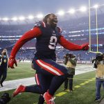 
              New England Patriots outside linebacker Matt Judon celebrates as he runs off the field following a 36-13 win over the Tennessee Titans after an NFL football game, Sunday, Nov. 28, 2021, in Foxborough, Mass. (AP Photo/Mary Schwalm)
            