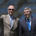 
              FILE - President of Brazil's Olympic Committee Carlos Arthur Nuzman, left, and International Olympic Committee (IOC) President Thomas Bach, right, visit Maracana stadium in Rio de Janeiro, Brazil, on Jan. 22, 2014. Nuzman, the head of the Brazilian Olympic Committee for more than two decades, was sentenced to 30 years and 11 months in jail for allegedly buying votes for Rio de Janeiro to host the 2016 Olympics. The ruling by Judge Marcelo Bretas became public Thursday, Nov. 25, 2021. (AP Photo/Felipe Dana, File)
            