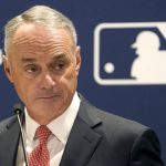 
              Major League Baseball commissioner Rob Manfred listens to a question Thursday, Nov. 18, 2021, during a news conference in Chicago. (AP Photo/Charles Rex Arbogast)
            
