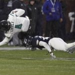
              Coastal Carolina tight end Isaiah Likely (4) is tackled by Georgia Southern cornerback Seth Robertson (20) in the first half of an NCAA college football game, Saturday, Nov. 6, 2021, in Statesboro, Ga. (AP Photo/Brynn Anderson)
            