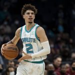 
              Charlotte Hornets guard LaMelo Ball (2) looks to pass the ball during the first half of an NBA basketball game against the Cleveland Cavaliers, Monday, Nov. 1, 2021, in Charlotte, N.C. (AP Photo/Matt Kelley)
            