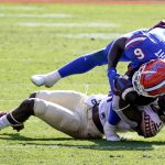 
              Florida running back Nay'Quan Wright (6) is tackled by Florida State linebacker Amari Gainer during the first half of an NCAA college football game, Saturday, Nov. 27, 2021, in Gainesville, Fla. Wright was injured on the play. (AP Photo/John Raoux)
            