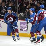 
              Colorado Avalanche defenseman Devon Toews, left, celebrates his goal with defenseman Samuel Girard, second from left, and center Nazem Kadri during the first period of the team's NHL hockey game against the San Jose Sharks on Saturday, Nov. 13, 2021, in Denver. (AP Photo/David Zalubowski)
            