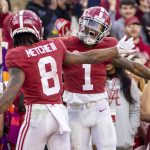 
              Alabama wide receiver Jameson Williams (1) celebrate this second touchdown reception with wide receiver John Metchie III (8) during the first half of an NCAA college football game against Arkansas, Saturday, Nov. 20, 2021, in Tuscaloosa, Ala. (AP Photo/Vasha Hunt)
            