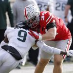 
              Michigan State defensive back Ronald Williams, left, tackles Ohio State tight end Mitch Rossi during the first half of an NCAA college football game Saturday, Nov. 20, 2021, in Columbus, Ohio. (AP Photo/Jay LaPrete)
            