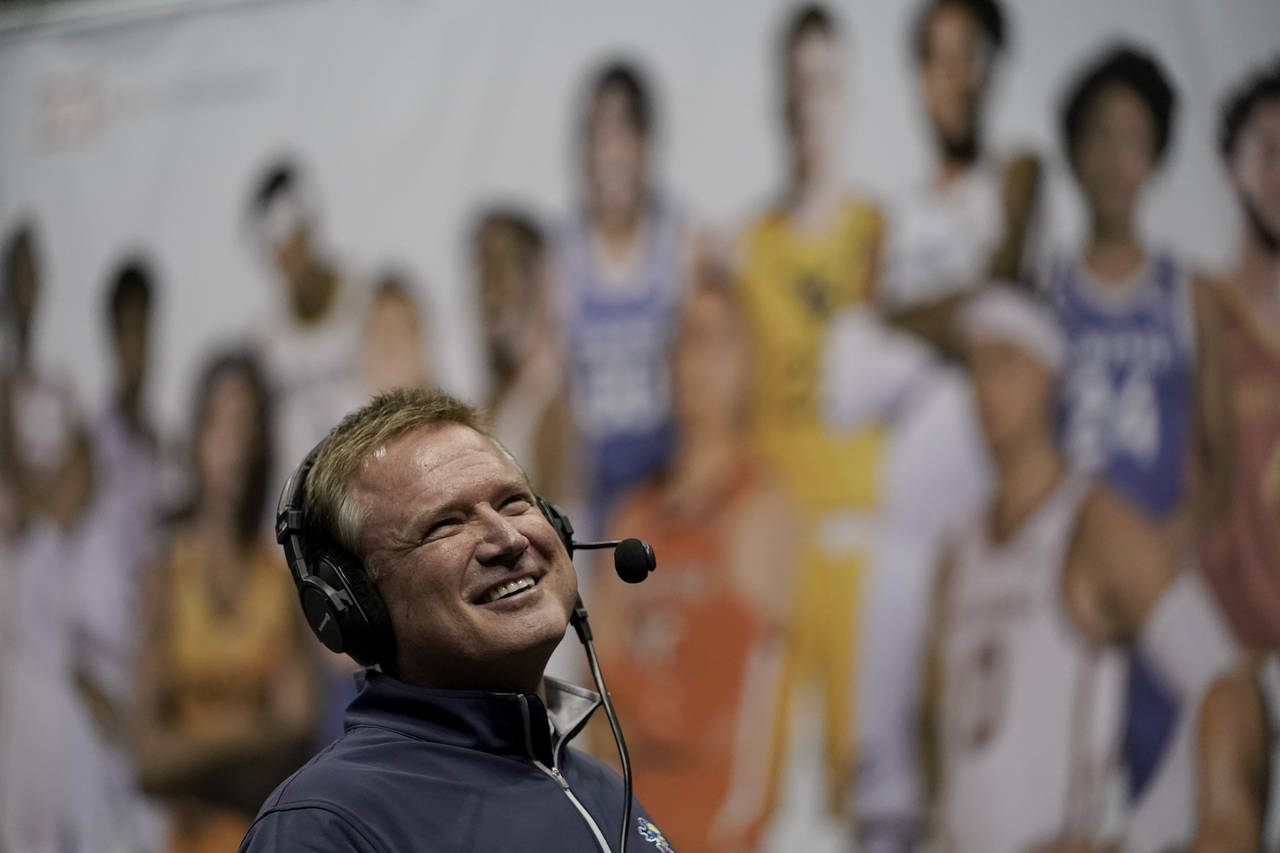Kansas coach Bill Self does an interview during Big 12 NCAA college basketball media day Wednesday,...