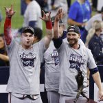 
              Atlanta Braves' Joc Pederson, left, and Josh Tomlin celebrate the team's win over the Houston Astros in Game 6 of the baseball World Series, Tuesday, Nov. 2, 2021, in Houston. (Kevin M. Cox/The Galveston County Daily News via AP)
            