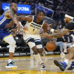 
              Minnesota Timberwolves forward Anthony Edwards (1) drives to the basket between Golden State Warriors forward Andre Iguodala, left, and guard Gary Payton II during the first half of an NBA basketball game in San Francisco, Wednesday, Nov. 10, 2021. (AP Photo/Jeff Chiu)
            