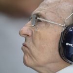 
              FILE - Team principal of Williams F1 team Sir Frank Williams waits during the third training session at the race track  in Spielberg, Austria, on June 21, 2014. Sir Frank Williams, the founder and former team principal of Williams Racing, has died. He was 79. Williams took his motor racing team from an empty carpet warehouse to the summit of Formula One, overseeing 114 victories, a combined 16 drivers' and constructors' world championships, while becoming the longest-serving team boss in the sport's history. (AP Photo/Kerstin Joensson, File)
            