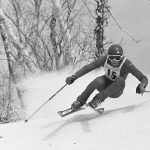 
              FILE - Mike Lafferty, Eugene, Ore. in Sapporo non-stop training run of Olympic men?s downhill on Mt. Eniwa track in which he finished fifth, Feb. 6, 1972. The northern Japanese city of Sapporo is set to announce on Monday, Nov. 29, 2021, what it says will be a reduction in costs that will make it an attractive venue for the 2030 Winter Olympics. (AP Photo/Michel Lipchitz, File)
            