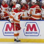 
              Calgary Flames left wing Johnny Gaudreau (13) celebrates his goal during the first period of an NHL hockey game against the Buffalo Sabres, Thursday, Nov. 18, 2021, in Buffalo, N.Y. (AP Photo/Jeffrey T. Barnes)
            