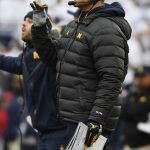 
              Michigan head coach Jim Harbaugh watches from the sideline during an NCAA college football game against Penn State in State College, Pa., Saturday, Nov. 13, 2021. Michigan defeated Penn State 21-17. (AP Photo/Barry Reeger)
            