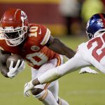 
              Kansas City Chiefs wide receiver Tyreek Hill (10) runs with the ball after catching a pass as New York Giants safety Xavier McKinney (29) defends during the first half of an NFL football game Monday, Nov. 1, 2021, in Kansas City, Mo. (AP Photo/Charlie Riedel)
            