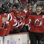
              New Jersey Devils defenseman Dougie Hamilton, right, celebrates his goal with teammates during the first period of an NHL hockey game against the Philadelphia Flyers Sunday, Nov. 28, 2021, in Newark, N.J. (AP Photo/Bill Kostroun)
            
