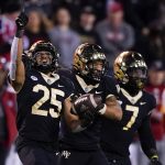 
              Wake Forest defensive back J.J. Roberts celebrates after an inception against North Carolina State during the first half of an NCAA college football game Saturday, Nov. 13, 2021, in Winston-Salem, N.C. (AP Photo/Chris Carlson)
            