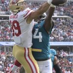 
              Jacksonville Jaguars linebacker Myles Jack, right, breaks up a pass intended for San Francisco 49ers tight end Charlie Woerner (89) during the second half of an NFL football game, Sunday, Nov. 21, 2021, in Jacksonville, Fla. (AP Photo/Phelan M. Ebenhack)
            