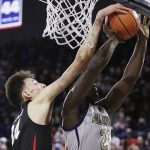 
              Gonzaga center Chet Holmgren, left, blocks a shot by Alcorn State forward Ladarius Marshall during the first half of an NCAA college basketball game Monday, Nov. 15, 2021, in Spokane, Wash. (AP Photo/Young Kwak)
            