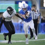 
              UNLV linebacker Jacoby Windmon, left, pursues Air Force running back Brad Roberts during the second half of an NCAA college football game Friday, Nov. 26, 2021, at Air Force Academy, Colo. Air Force won 48-14. (AP Photo/David Zalubowski)
            