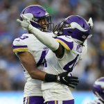 
              Minnesota Vikings safety Camryn Bynum (43) celebrates with safety Josh Metellus (44) after sacking Los Angeles Chargers quarterback Justin Herbert during the second half of an NFL football game Sunday, Nov. 14, 2021, in Inglewood, Calif. (AP Photo/Marcio Jose Sanchez)
            