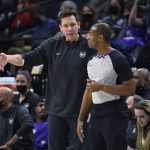 
              Sacramento Kings head coach Luke Walton, left, talks with referee John Butler during the first half of the team's NBA basketball game against the Minnesota Timberwolves on Wednesday, Nov. 17, 2021, in Minneapolis. The Timberwolves won 107-97. (AP Photo/Craig Lassig)
            