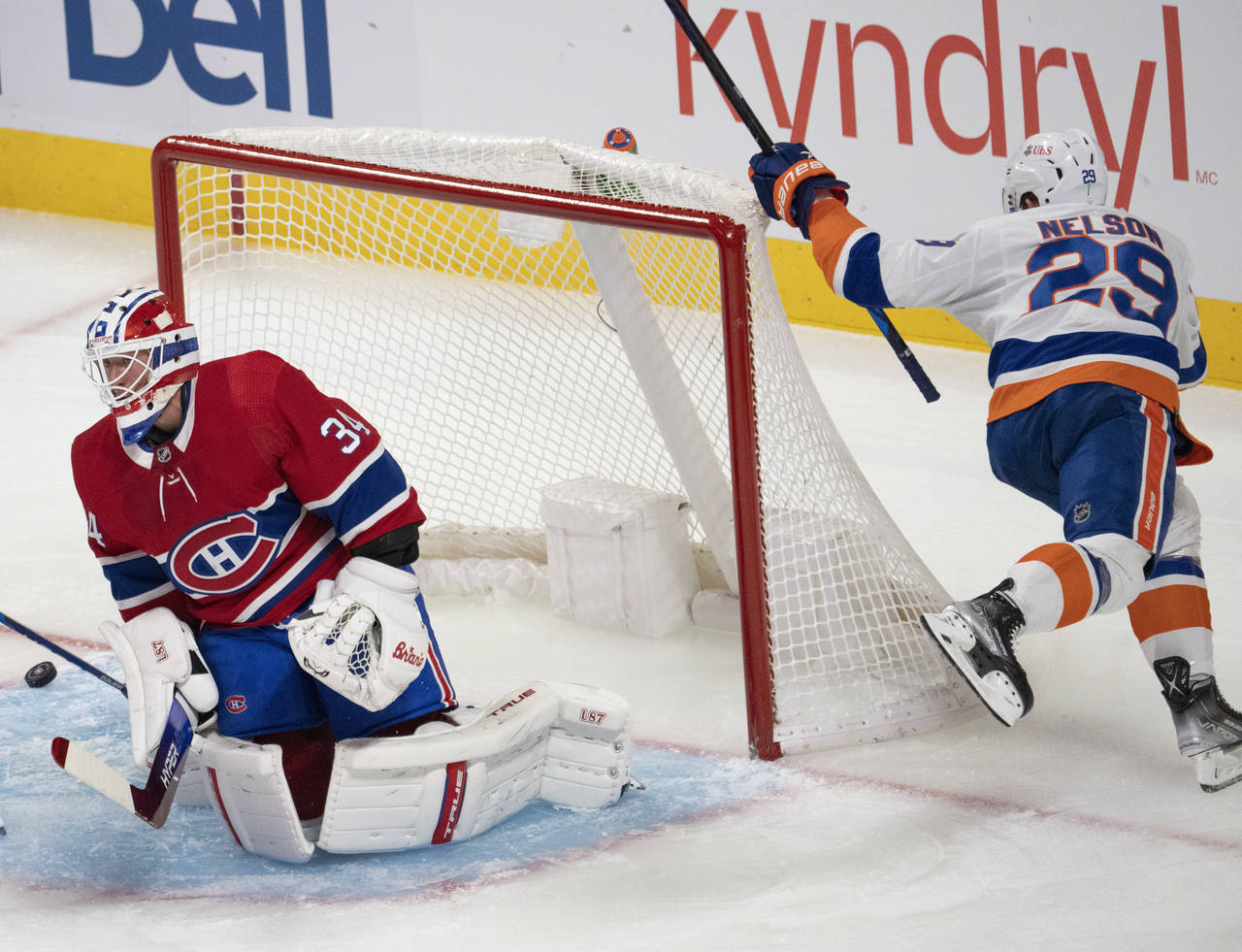 New York Islanders' Brock Nelson (29) scores on Montreal Canadiens goaltender Jake Allen (34) durin...