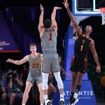 
              In a photo provided by Bahamas Visual Services, Loyola Chicago guard Lucas Williamson (1) shoots against Arizona State's Luther Muhammad during an NCAA college basketball game at Paradise Island, Bahamas, Friday, Nov. 26, 2021. (Tim Aylen/Bahamas Visual Services via AP)
            