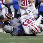 
              Memphis defensive back Greg Rubin (24) breaks up a pass intended for SMU wide receiver Reggie Roberson Jr. (21) in the first half of an NCAA college football game Saturday, Nov. 6, 2021, in Memphis, Tenn. (AP Photo/Mark Humphrey)
            