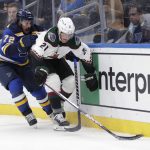 
              Arizona Coyotes' Loui Eriksson (21) fends off St. Louis Blues Justin Faulk (72) along the boards during the first period of an NHL hockey game Tuesday, Nov. 16, 2021, in St. Louis. (AP Photo/Tom Gannam)
            