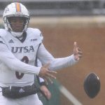 
              UTSA quarterback Frank Harris fumbles the ball during the first half of an NCAA college football game against North Texas in Denton, Texas, Saturday, Nov. 27, 2021. (AP Photo/Andy Jacobsohn)
            