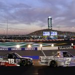 
              Kris Wright (2) leads Chandler Smith (18) early in the NASCAR Truck Series auto race at Phoenix Raceway on Friday, Nov. 5, 2021, in Avondale, Ariz. (AP Photo/Darryl Webb)
            