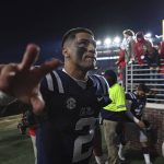 
              Mississippi quarterback Matt Corral (2) waves to fans while leaving the field after an NCAA college football game against Vanderbilt in Oxford, Miss., Saturday, Nov. 20, 2021. Mississippi won 31-17. (AP Photo/Thomas Graning)
            