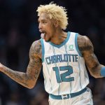 
              Charlotte Hornets guard Kelly Oubre Jr. reacts after making a basket against the Washington Wizards during the second half of an NBA basketball game in Charlotte, N.C., Wednesday, Nov. 17, 2021. (AP Photo/Jacob Kupferman)
            