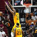 
              Miami Heat center Bam Adebayo (13) shoots as Utah Jazz center Hassan Whiteside (21) defends during the first half of an NBA basketball game, Saturday, Nov. 6, 2021, in Miami. (AP Photo/Lynne Sladky)
            